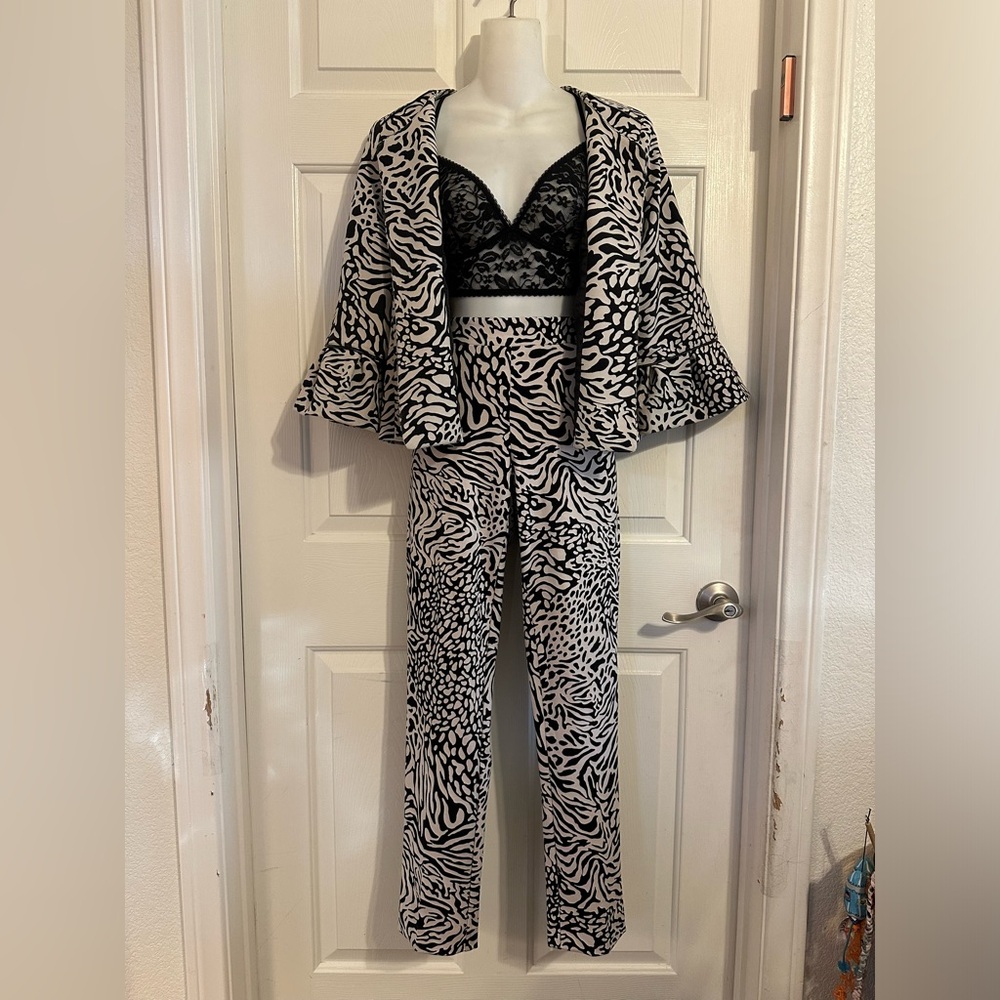 And Kline two piece animam print blazer and pants set